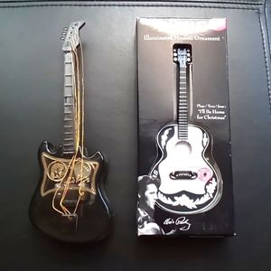 2 Elvis musical guitars